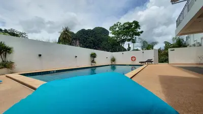 a swimming pool in the backyard of a house at 8 Palm Villa - Large Private Pool Villas in Aonang in Ao Nang Beach