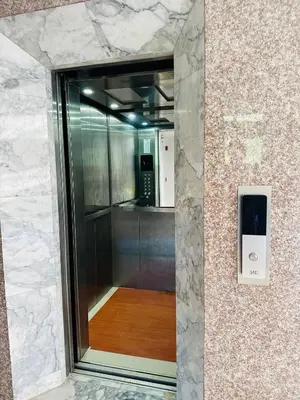 a walk in shower in a building with a mirror at Brand Naithon CondoC404 in Nai Thon Beach