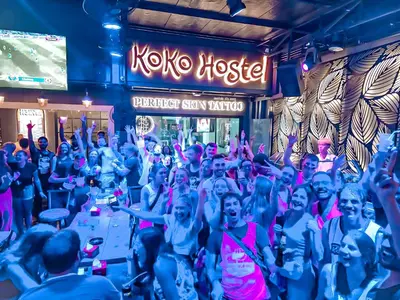 a group of people at a party in a bar at KOKO Party Hostel 18-40 in Ao Nang Beach
