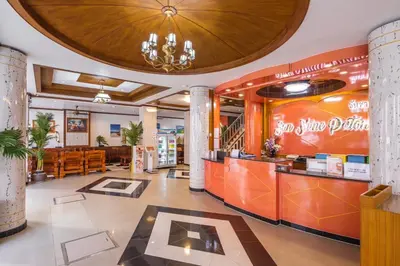 a lobby of a restaurant with a food court at Sunshine Patong in Patong Beach