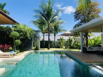 a swimming pool in the backyard of a house at Villa Jasmine - luxury private villa Bangtao Beach in Bang Tao Beach