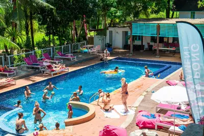 a group of people in a swimming pool at Nomads Ao Nang Party Hostel 18-35 Years Old Only in Ao Nang Beach