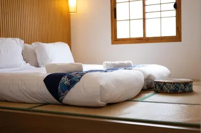a bed with pillows on the floor in a room at Villa Sunrise Garden B190 in Thalang