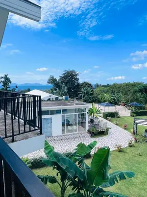 a view from the balcony of a house at White Seaview Residence in Klong Muang Beach