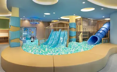 a childrens play room with a slide and a playground at Anantara Koh Yao Yai Resort & Villas in Ko Yao Yai