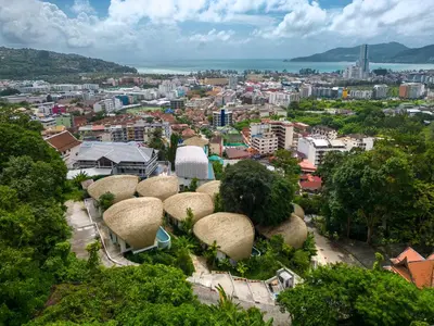 a view of a city with trees and buildings at Three Monkeys Villas in Patong Beach