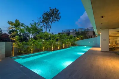 an infinity pool in a villa at night at CORNER SEA VIEW KRABI Ao Nang 4 STARS HOTEL RESIDENCE in Ao Nang Beach