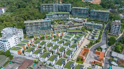 an aerial view of a city with tall buildings at Panora villa by VillaCarte in Surin Beach