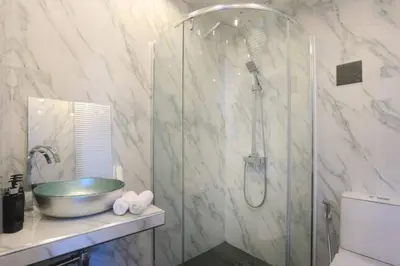 a bathroom with a glass shower with a sink at PATONG TOWER EXCLUSIVE FAMILYs SEA VIEW 2025 in Patong Beach