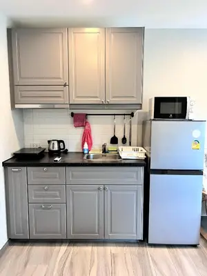 a kitchen with a white refrigerator and a sink at А2 ВАТСАП669З582I976 примем РУБЛИ in Nai Yang Beach