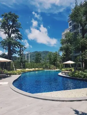 a swimming pool at a resort with umbrellas at А2 ВАТСАП669З582I976 примем РУБЛИ in Nai Yang Beach