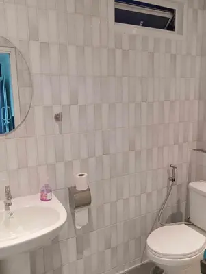 a bathroom with a toilet and a sink at Baan7984 Rawai in Rawai Beach