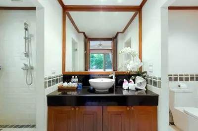 a bathroom with a sink and a mirror at Katamanda 3 Bed Tropical Villa B3 Near Kata Beach in Kata Beach