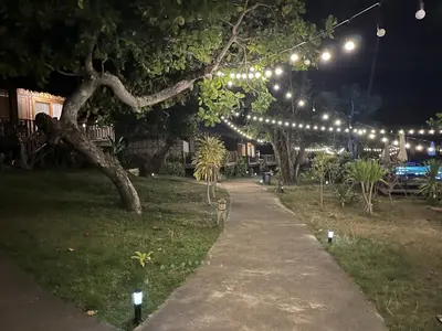 a path with lights in a park at night at Better View Koh Yao Yai in Ko Yao Yai
