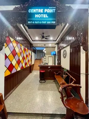 a waiting room at a centre point hotel with a bench at Centre Point Patong in Patong Beach