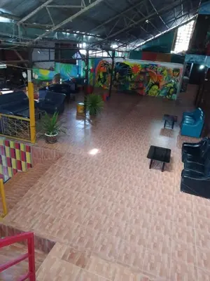 an overhead view of a room with chairs and a room with graffiti at Reggaeinn in Phi Phi Don