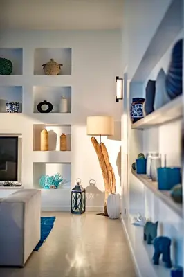 a living room with blue and white shelves at Nai Harn Beach 4 bedroom Pool Villa, Rawai, Phuket in Phuket Town