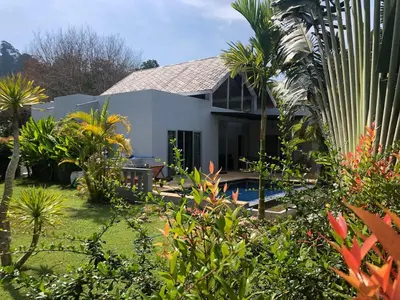 a view of a house from the garden at Villa B23 Phuket in Nai Yang Beach