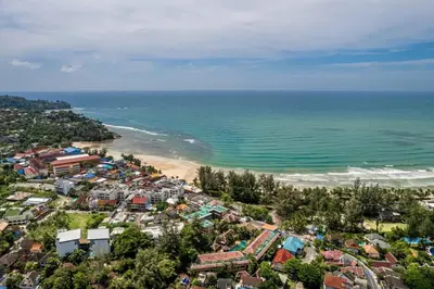 an aerial view of a city and the beach at Kamala Regent : Beautiful Modern Apartment close to Kamala beach in Kamala Beach