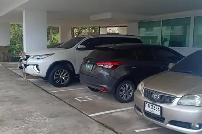 a group of cars parked in a parking lot at Kata Ocean View Luxury condo & Seaview K12 in Kata Beach