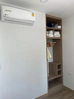 a room with a air conditioner on the wall at SkyPark Laguna Phuket с террасой in Bang Tao Beach