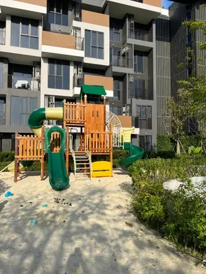 a playground in front of a apartment building at SkyPark Laguna Phuket с террасой in Bang Tao Beach