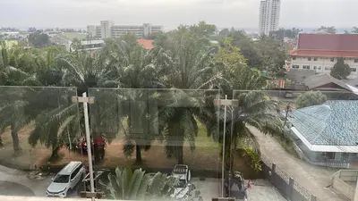 a view of a city with palm trees and cars at Апартаменты с видом на море на Карон Бич А 509 in Karon Beach