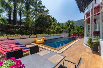 a pool with a rubber duck in the middle of a house at Villa Nap Dau private pool villa for big Family and Friends in Ban Klang