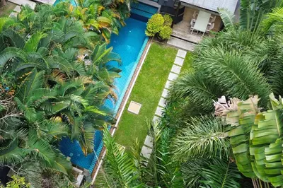 an overhead view of a swimming pool with palm trees at Your Private Paradise - 2BR Tropical Pool Villa Astree in Rawai Beach