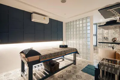 a bedroom with a bed in a room at Kamala D38 Exclusive Junior Suite in Kamala Beach