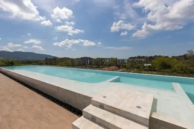 a large swimming pool on top of a building at Laguna Skypark by My Home Phuket in Bang Tao Beach