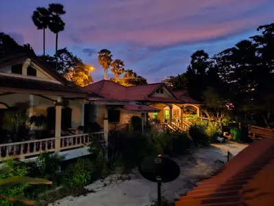 a house at night with the lights on at Elephant bungalow at Ya Nui beach in Phuket Town