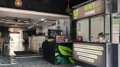 a restaurant with a food counter in a store at Lime Hotel in Patong Beach