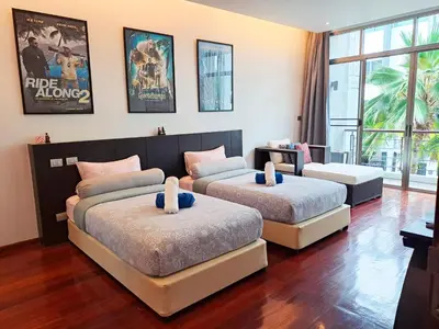 a bedroom with two beds and a large window at Villa Sabine private pool 4br seaview jacuzzi in Rawai Beach