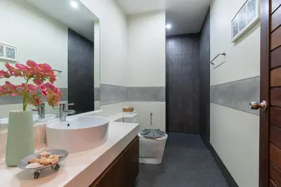 a bathroom with a sink and a toilet at Andaman 3br Private Pool Villa in Rawai Beach