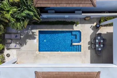 an overhead view of a swimming pool at Oriental 3br private Pool Villa in Rawai Beach