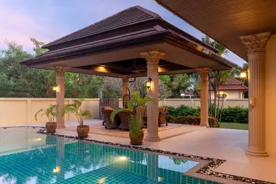 a gazebo with a pool in a backyard at Villa Rodentia 3br pool Villa in Rawai Beach