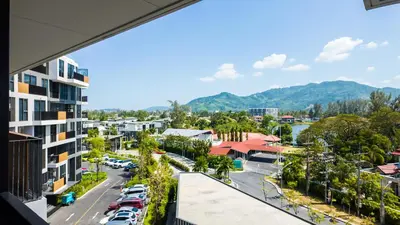 a view of a city from a building at Уютные апартаменты в Laguna Skypark in Phuket Town