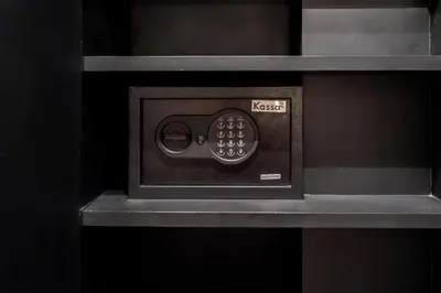 a microwave oven with a control panel on a shelf at 5 Stars Facilities Condo Kamala Beach in Kamala Beach