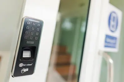 a remote control sitting on the side of a door at Kai Mook House in Ban Ket Ho